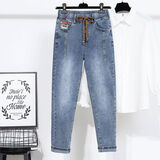 歌班娅200斤大码胖妹妹松紧腰牛仔裤女2025春秋新款加肥加大弹力哈伦裤 灰蓝色【常规款】 2XL （推荐135-150斤）