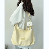 卡特骆情人节帆布包女新款休闲单肩托特包斜挎学生上课通勤云朵包潮 黄色【带长腿云朵挂件】