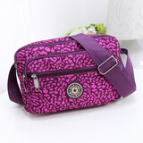 途尊（kingtrip）斜挎包时尚百搭单肩妈妈小花布包中年女包包休闲尼龙帆布包中老年 紫色豹纹