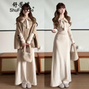 舒芳蝶（shufangdie）巨好看斗篷针织连衣裙女秋冬2025新款富家千金风韩系穿搭套装长裙 燕麦色外套+杏色连衣裙【套装】 M