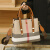 酷奇袋鼠（KUQIDAISHU）轻奢大容量手提单肩包包2024新款潮时尚通勤斜挎水桶包女包 棕色