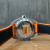 欧米茄（OMEGA）全球联保海马系列600米防水瑞士天文台自动机械男士运动腕表 215.32.44.21.01.001黑橙胶带