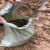 严品安防 50条防汛沙袋沙包 加厚耐磨灰绿色蛇皮编织袋 载重袋50*80CM