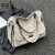 袋鼠质感包包女大容量2024新款时尚百搭软皮斜挎包手提通勤托特包 黑色