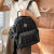 酷奇袋鼠（KUQIDAISHU）双肩包女韩版学院风铆钉书包2024新款时尚印花休闲大容量旅行背包 棕色 带小狗挂件