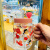 牛奶杯成人圆形韩式卡通玻璃水杯子学生新生成人儿童牛奶杯 把杯牛奶妹+草莓粉硅胶盖+玻璃弯吸管 1ml