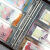 明泰 纸币收藏册钱币收藏册人民币保护册缝线活页皮革收纳册 黑色(20张透明单面 60张装)