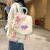 JPHZNB广州狮岭包包机灵姐书包女生书包新款初中高中高中生可爱背包大容 白粉加花朵挂件加强面料防泼水